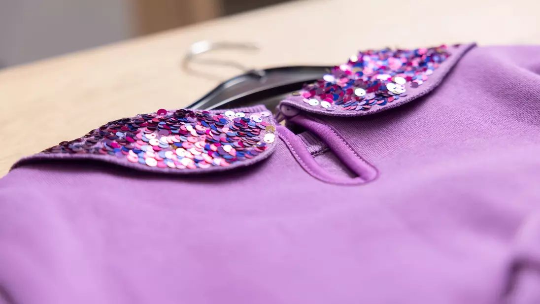 Paars topje met pailletten uit het kinderassortiment